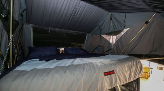 Stable construction of the roof tent featuring a king-size bed in the Conqueror Comfort Platinum Edition off-road camper trailer