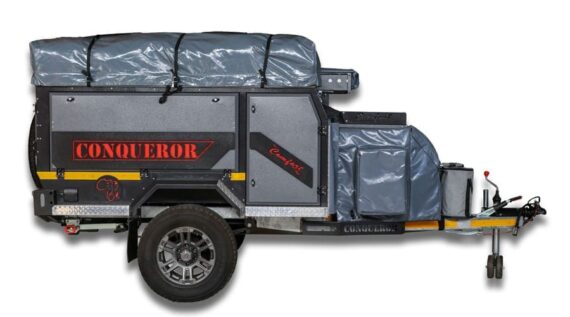 Right side view of the fully packed and ready-to-go Conqueror Comfort Platinum Edition off-road camper trailer