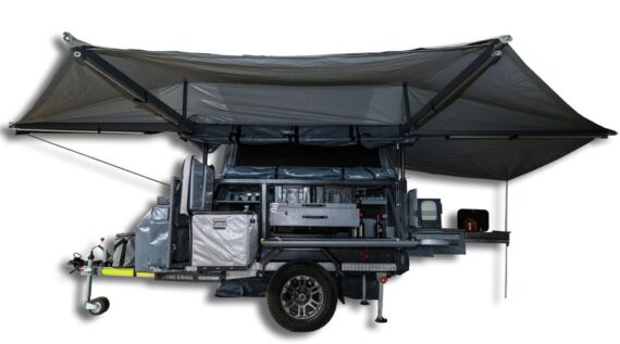 Side view of the meticulously designed outdoor kitchen with awning cover